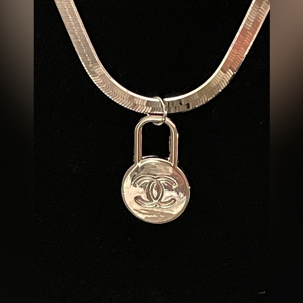 Authentic Chanel charm  /Fine Italian sterling silver necklace, and bracelet